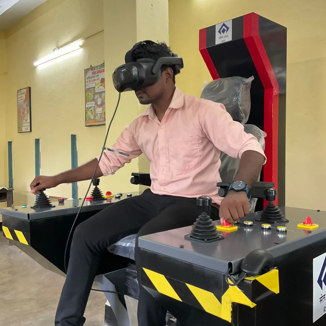Trainee using the Arise Crane Simulator cabin-crane simulator seat at SAIL Rourkela Steel Plant